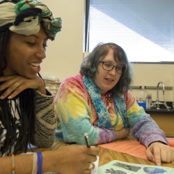 A tutor helping a student